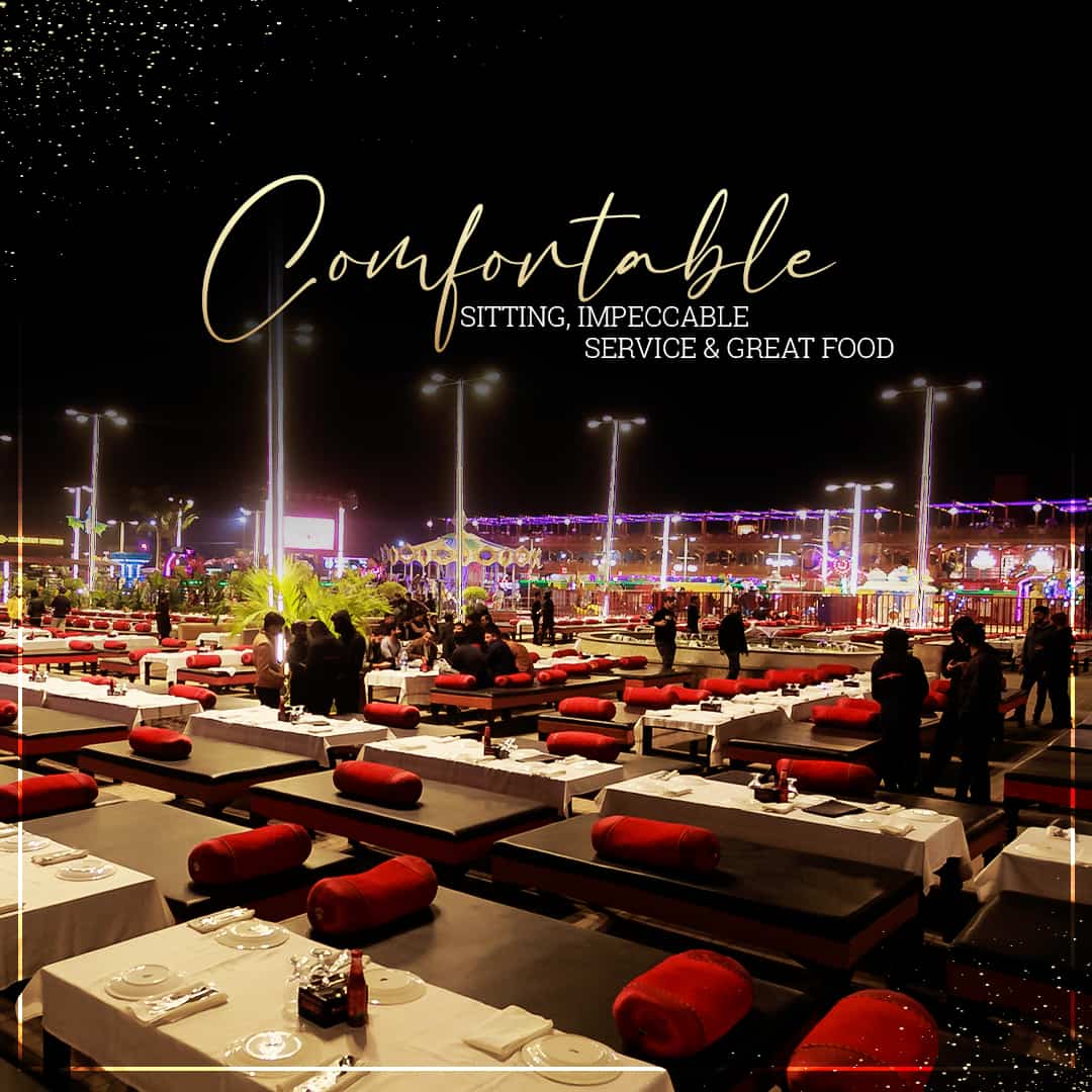 Open-air floor seating under the lights