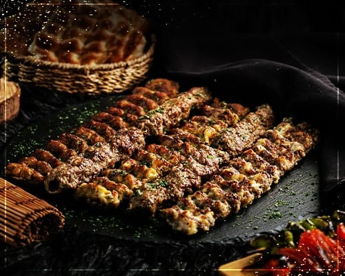 Seekh kababs on a hot platter